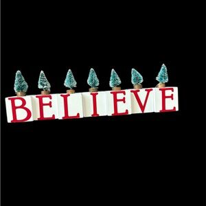 Festive 'Believe' Holiday Decor with Red Letters and Green Trees
